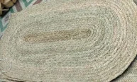 Tapis ovale en mendong disponible chez Zen Évasion